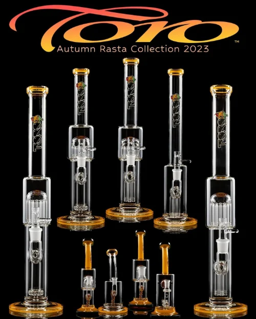 Collection of glass water pipes with autumn-themed decals.